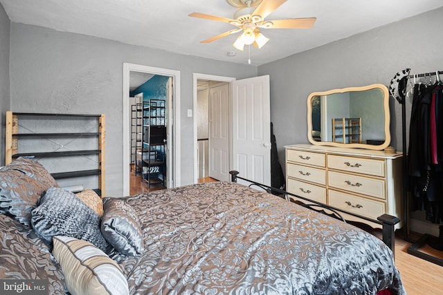 1409 S Clarion St, Philadelphia, PA 19147 - bedroom with wood finished floors, a textured wall, and a ceiling fan