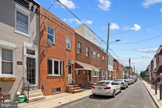 1409 S Clarion St, Philadelphia, PA 19147 - view of street with entry steps, street lights, sidewalks, and curbs