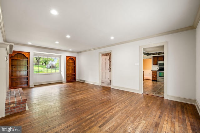 1050 Powderhorn Dr, Glen Mills, PA 19342 - unfurnished living room featuring ornamental molding, wood-type flooring, baseboards, and recessed lighting