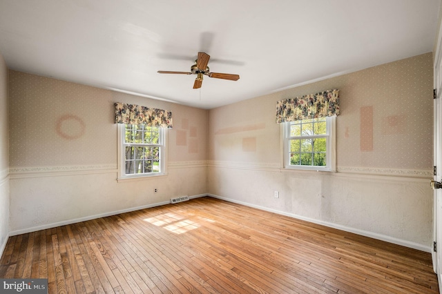1050 Powderhorn Dr, Glen Mills, PA 19342 - spare room with plenty of natural light, hardwood / wood-style flooring, ceiling fan, and baseboards