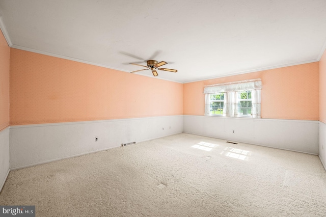 1050 Powderhorn Dr, Glen Mills, PA 19342 - spare room with ceiling fan, crown molding, wainscoting, and carpet flooring