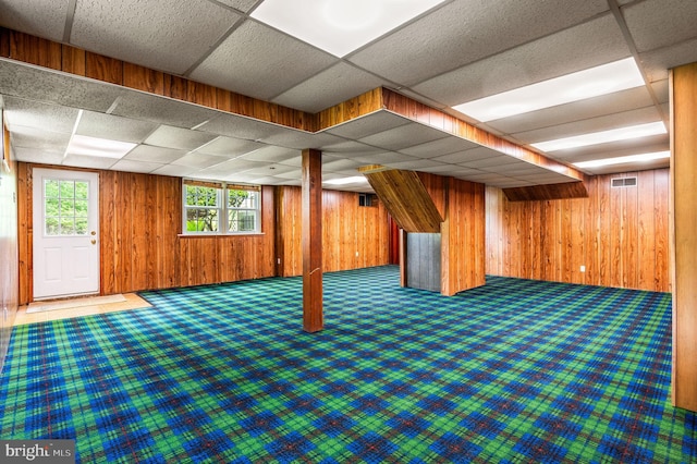 1050 Powderhorn Dr, Glen Mills, PA 19342 - below grade area featuring wood walls, carpet floors, and a paneled ceiling