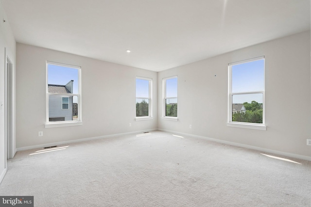 43730 Transit Sq, Ashburn, VA 20147 - empty room with plenty of natural light, baseboards, and light colored carpet