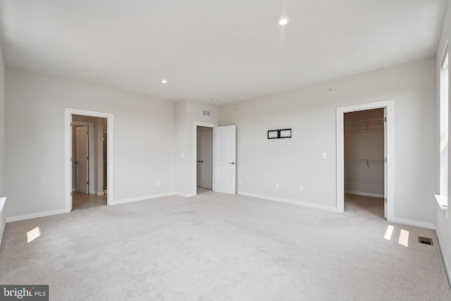 43730 Transit Sq, Ashburn, VA 20147 - unfurnished bedroom with light colored carpet, baseboards, and recessed lighting