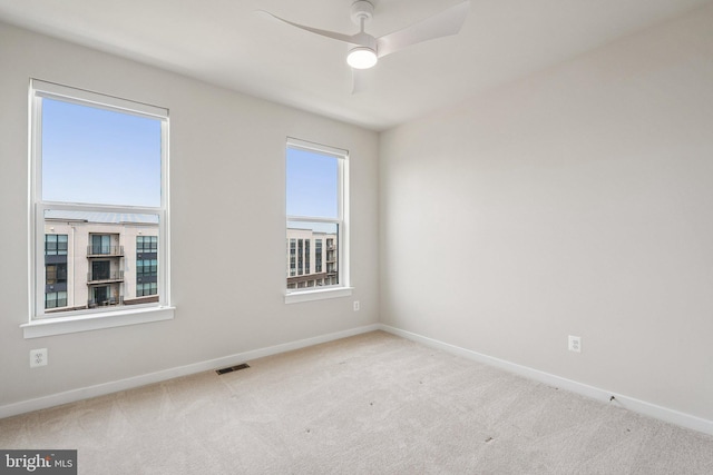43730 Transit Sq, Ashburn, VA 20147 - unfurnished room featuring carpet flooring, baseboards, and a ceiling fan