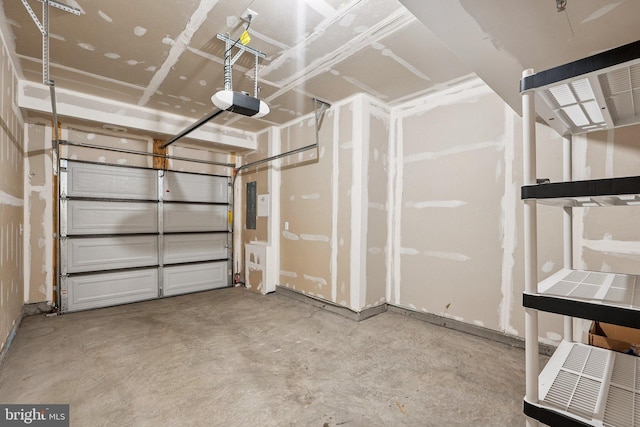 43730 Transit Sq, Ashburn, VA 20147 - garage with a garage door opener and electric panel