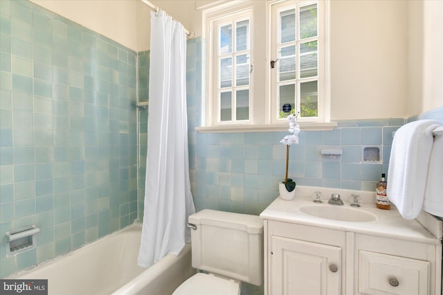 3419 Lowell St NW, Washington, DC 20016 - full bathroom with healthy amount of natural light, shower / bath combo, vanity, and tile walls