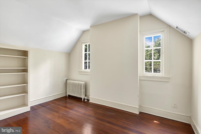 3419 Lowell St NW, Washington, DC 20016 - additional living space featuring radiator, hardwood / wood-style floors, and lofted ceiling