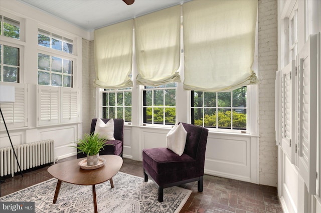 3419 Lowell St NW, Washington, DC 20016 - sunroom / solarium with radiator heating unit and brick patterned flooring