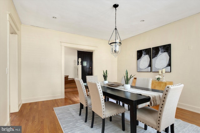 3419 Lowell St NW, Washington, DC 20016 - dining area featuring light wood-type flooring and stairway