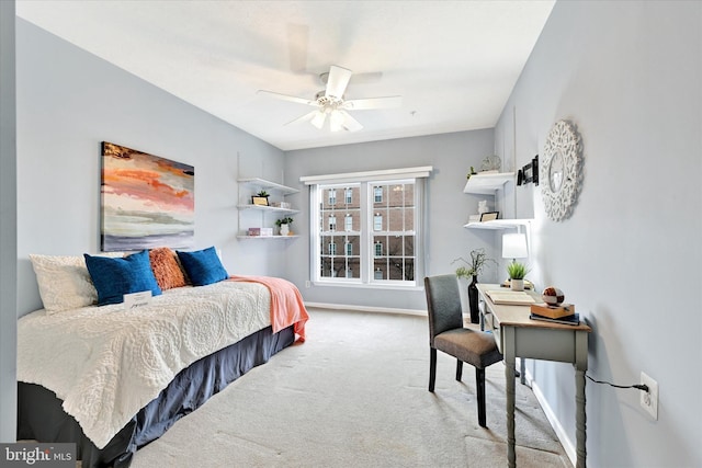 bedroom with carpet floors, baseboards, and a ceiling fan