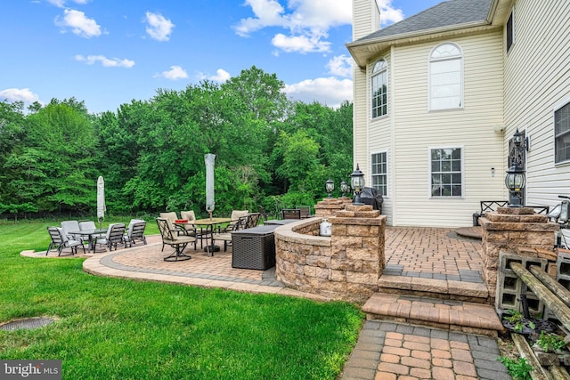 310 Nicklaus Ct, Woolwich Twp, NJ 08085 - view of patio with an outdoor fire pit