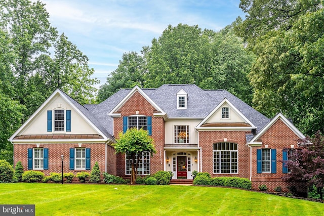 11709 Pine Tree Dr, Fairfax, VA 22033 - view of front of home with brick siding, a front yard, and stucco siding