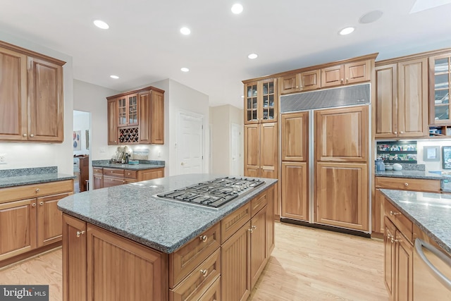 11709 Pine Tree Dr, Fairfax, VA 22033 - kitchen featuring paneled built in refrigerator, stainless steel gas stovetop, dishwasher, light wood-style floors, and recessed lighting