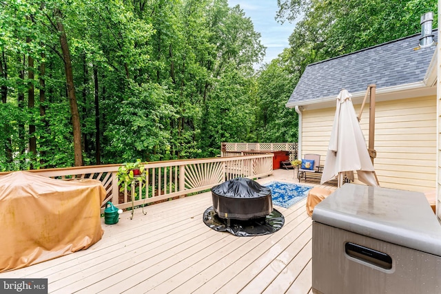 11709 Pine Tree Dr, Fairfax, VA 22033 - wooden deck featuring a fire pit