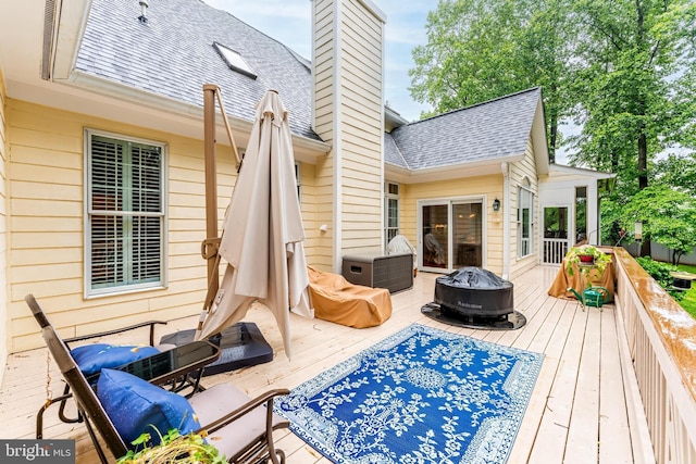 11709 Pine Tree Dr, Fairfax, VA 22033 - wooden terrace with a fire pit