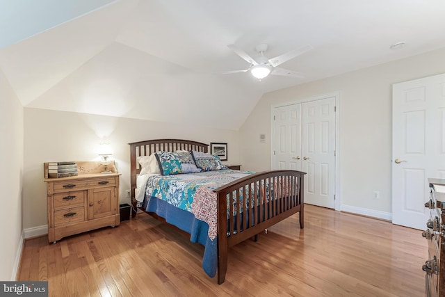 11709 Pine Tree Dr, Fairfax, VA 22033 - bedroom featuring light wood-style floors, lofted ceiling, baseboards, ceiling fan, and a closet
