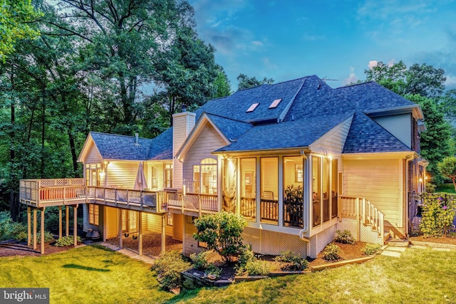 11709 Pine Tree Dr, Fairfax, VA 22033 - back of property with a shingled roof, a chimney, a lawn, and a deck