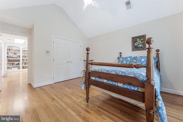 11709 Pine Tree Dr, Fairfax, VA 22033 - bedroom with light wood finished floors, vaulted ceiling, baseboards, a ceiling fan, and a closet