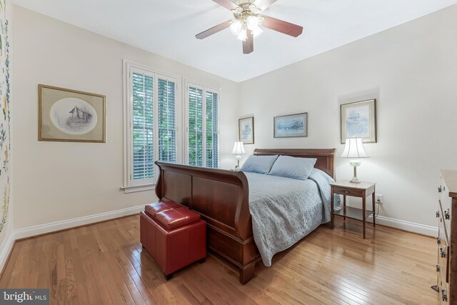 11709 Pine Tree Dr, Fairfax, VA 22033 - bedroom with light wood-type flooring, baseboards, and a ceiling fan