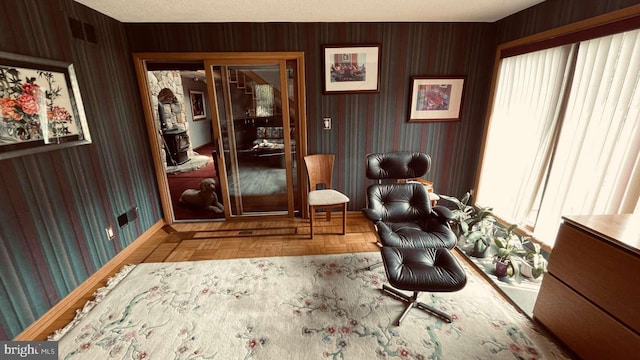 33 Morgan Hollow Way, Landenberg, PA 19350 - living area with wallpapered walls, baseboards, and french doors
