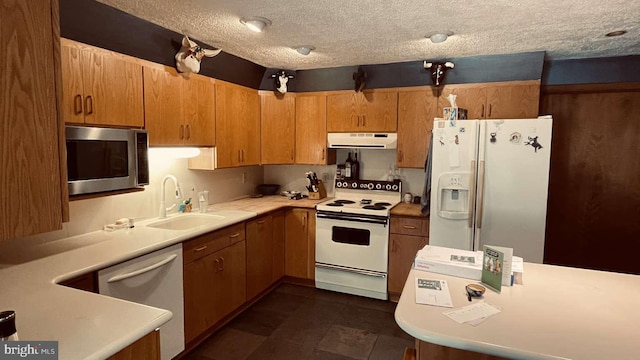 33 Morgan Hollow Way, Landenberg, PA 19350 - kitchen with white appliances, extractor fan, a sink, light countertops, and a textured ceiling