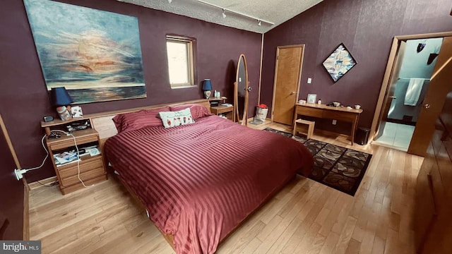 33 Morgan Hollow Way, Landenberg, PA 19350 - bedroom featuring light wood finished floors, a textured ceiling, and vaulted ceiling