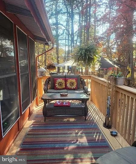 79 Martin Dr, Whiting, NJ 08759 - wooden deck featuring outdoor lounge area