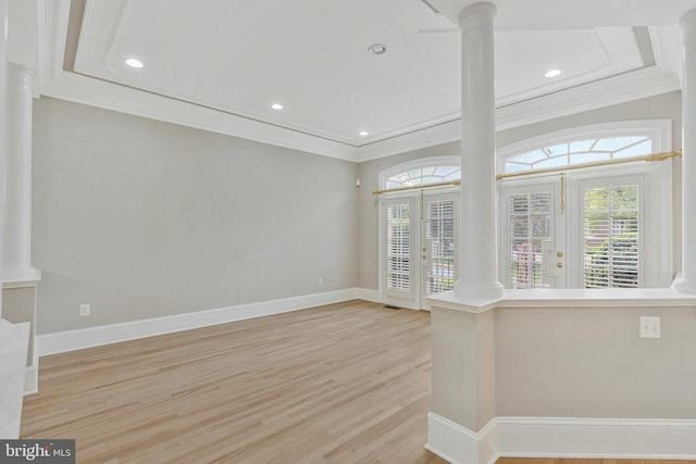 1473 Evans Farm Dr, Mclean, VA 22101 - spare room featuring decorative columns, ornamental molding, healthy amount of natural light, light wood-style floors, and baseboards