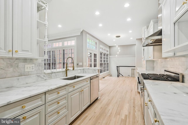 1473 Evans Farm Dr, Mclean, VA 22101 - kitchen with a sink, stainless steel dishwasher, light wood-style floors, decorative backsplash, and recessed lighting