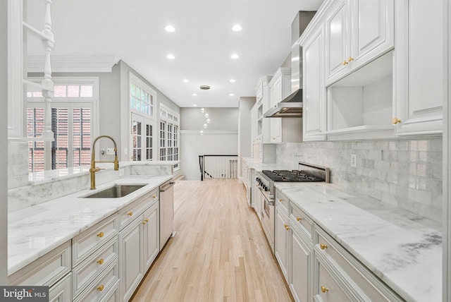 1473 Evans Farm Dr, Mclean, VA 22101 - kitchen with a sink, light wood finished floors, recessed lighting, tasteful backsplash, and appliances with stainless steel finishes