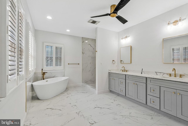 1473 Evans Farm Dr, Mclean, VA 22101 - bathroom featuring ceiling fan, marble finish flooring, double vanity, a marble finish shower, and a soaking tub