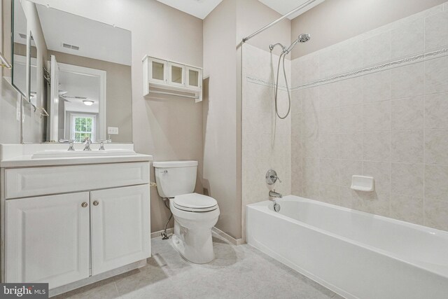 1473 Evans Farm Dr, Mclean, VA 22101 - full bath with toilet, vanity, tub / shower combination, baseboards, and tile patterned floors