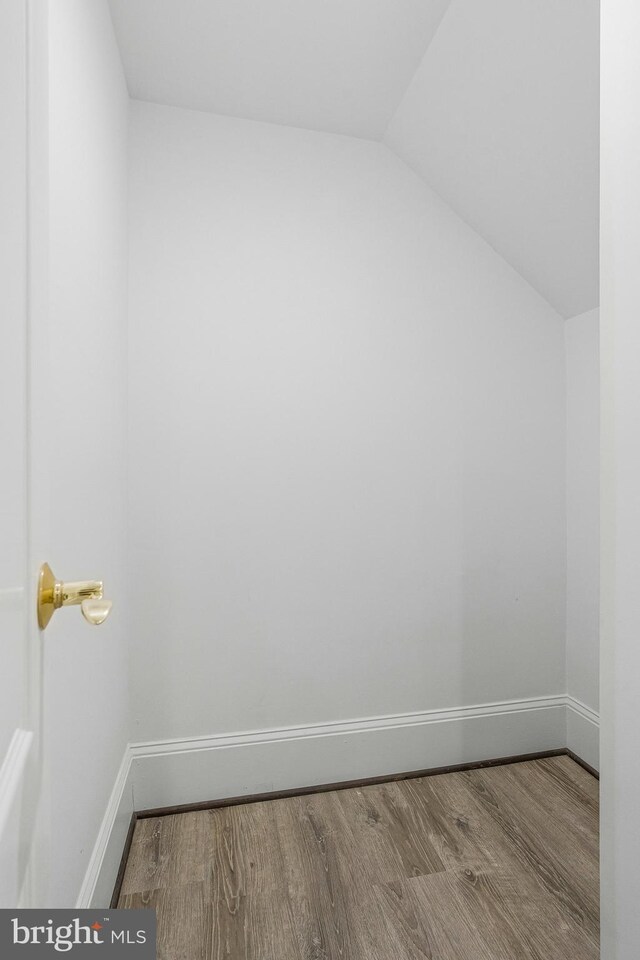 1473 Evans Farm Dr, Mclean, VA 22101 - bonus room with wood finished floors, vaulted ceiling, and baseboards