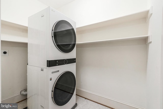 1473 Evans Farm Dr, Mclean, VA 22101 - laundry room featuring stacked washer / drying machine and baseboards