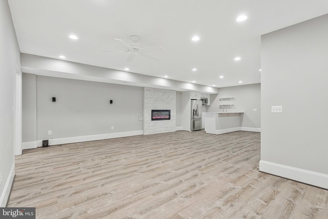 1473 Evans Farm Dr, Mclean, VA 22101 - unfurnished living room with baseboards, a ceiling fan, light wood finished floors, recessed lighting, and a fireplace