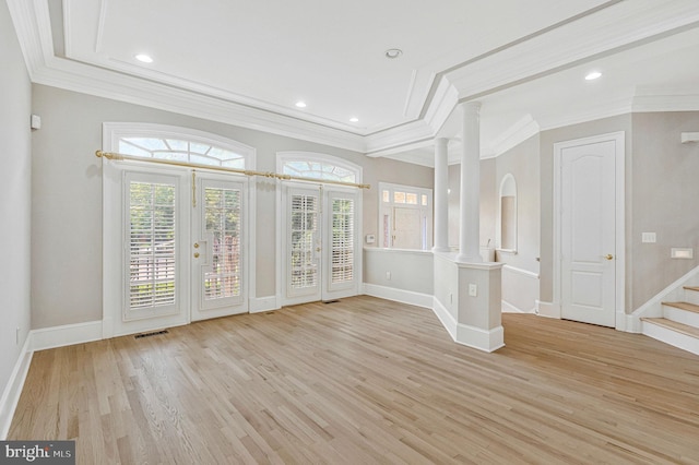 1473 Evans Farm Dr, Mclean, VA 22101 - spare room with ornamental molding, decorative columns, light wood-type flooring, baseboards, and stairs