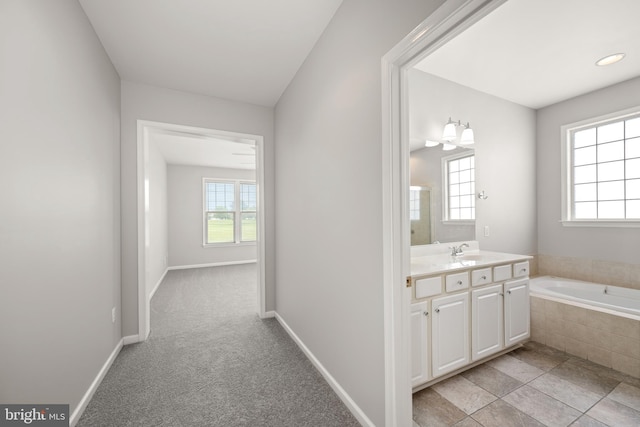 30 Amandas Teal Dr, Bridgeville, DE 19933 - bathroom featuring vanity, a bath, and baseboards
