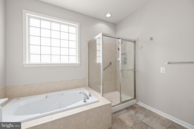30 Amandas Teal Dr, Bridgeville, DE 19933 - full bathroom featuring a bath, a shower stall, and baseboards