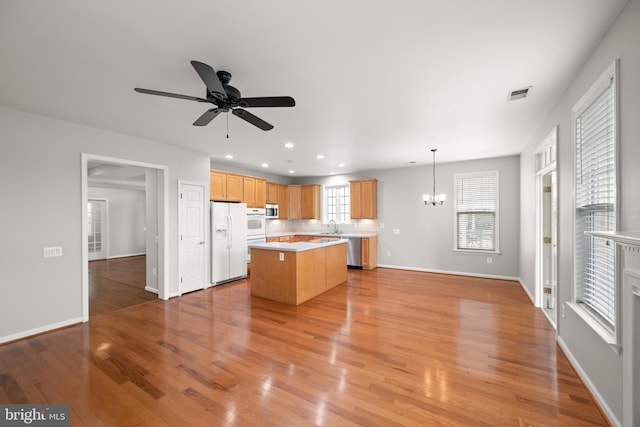 30 Amandas Teal Dr, Bridgeville, DE 19933 - kitchen with stainless steel appliances, light countertops, a sink, a ceiling fan, and light wood finished floors