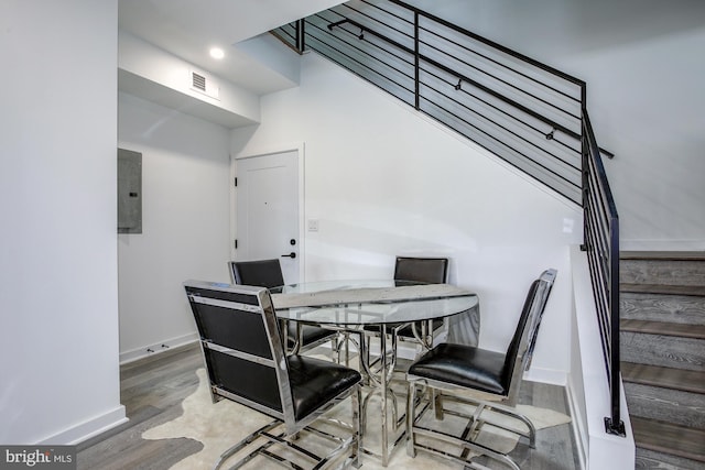 1732 Montello Ave NE Unit 7, Washington, DC 20002 - dining space featuring stairway, wood finished floors, baseboards, and electric panel