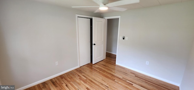 2205 Roth Rd, Edgewood, MD 21040 - unfurnished bedroom with light wood-style floors, baseboards, a closet, and ceiling fan