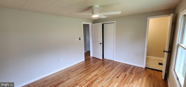 2205 Roth Rd, Edgewood, MD 21040 - unfurnished bedroom featuring light wood finished floors, a closet, baseboards, and a ceiling fan