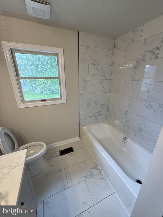 2205 Roth Rd, Edgewood, MD 21040 - full bath with marble look tile flooring, toilet, baseboards, and vanity