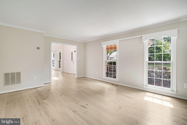 5926 Clermont Landing Ct, Burke, VA 22015 - spare room featuring crown molding, light wood finished floors, plenty of natural light, and baseboards