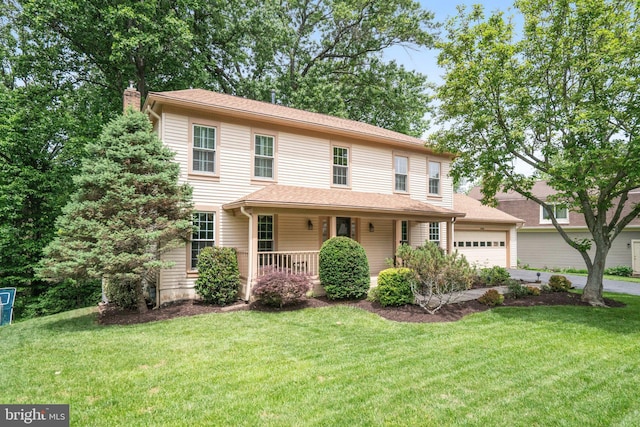 5926 Clermont Landing Ct, Burke, VA 22015 - view of front of property with a porch, a chimney, a front yard, and an attached garage