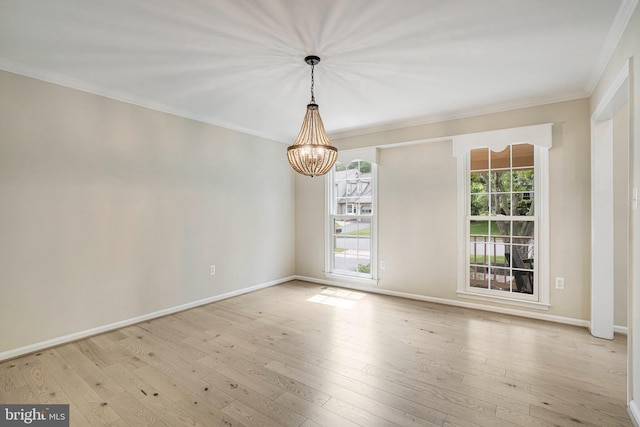 5926 Clermont Landing Ct, Burke, VA 22015 - empty room featuring a chandelier, crown molding, hardwood / wood-style floors, and baseboards
