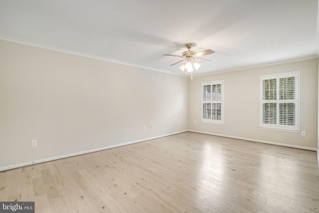 5926 Clermont Landing Ct, Burke, VA 22015 - spare room with a ceiling fan, ornamental molding, light wood finished floors, and baseboards