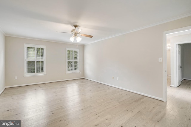 5926 Clermont Landing Ct, Burke, VA 22015 - spare room featuring crown molding, ceiling fan, light wood-type flooring, and baseboards