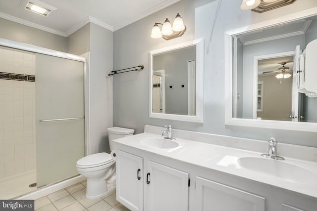 5926 Clermont Landing Ct, Burke, VA 22015 - bathroom featuring a stall shower, toilet, double vanity, tile patterned flooring, and ornamental molding